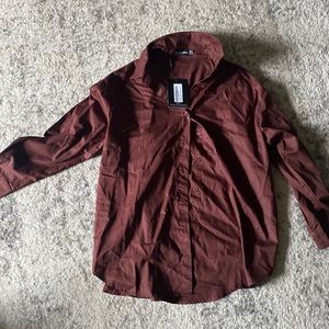 Dress shirt. Can be work as a oversized shirt.